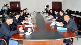 李涛、马富国与李湘平会谈时表示加强合作推动共同发展
