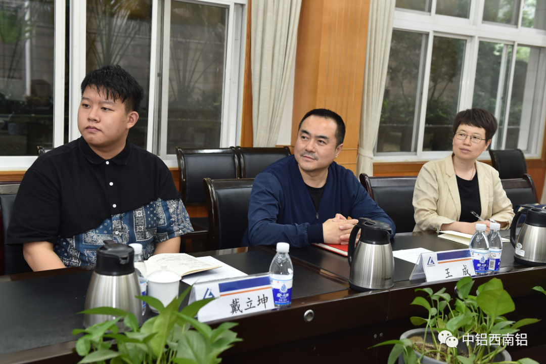 西南铝领导会见上游新闻副总裁王成