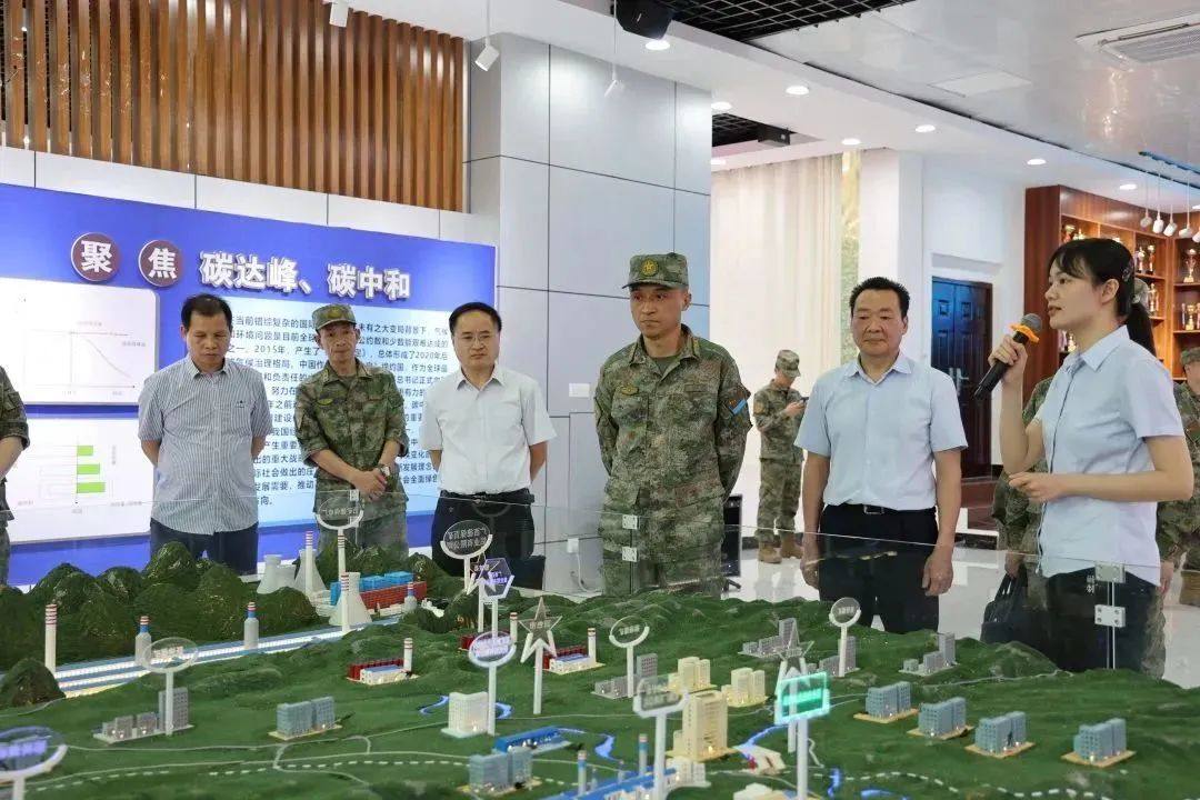 百色市军分区司令员葛丰一行到吉利百矿集团考察调研