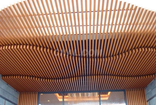 萬達影院牆身吊頂裝飾木紋鋁方通